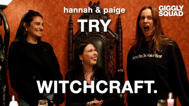 Three women in black clothing.