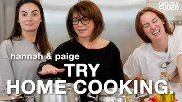 Three women in a kitchen.
